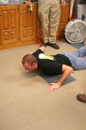 2010-01-12-ITOC-R1-TeamLead-026-Travis-gets-tazed.JPG
