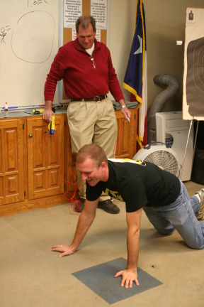 2010-01-12-ITOC-R1-TeamLead-030-Travis-gets-tazed.JPG