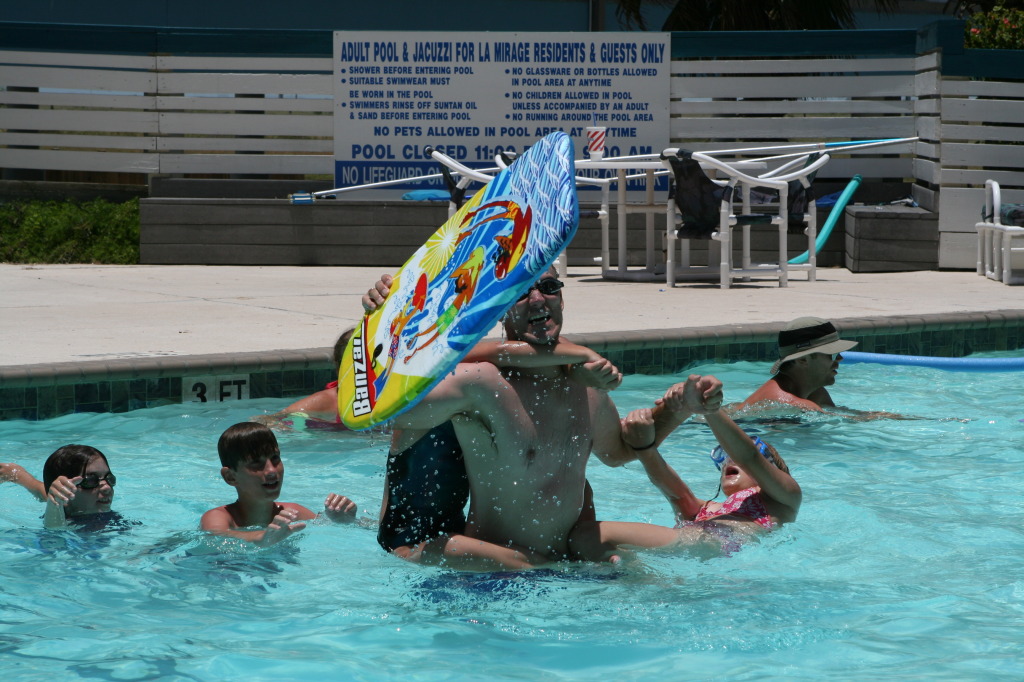 2010-07-05-Port-Aransas-041-Travis-Chance-Dax-pool-wrestling-kids.JPG