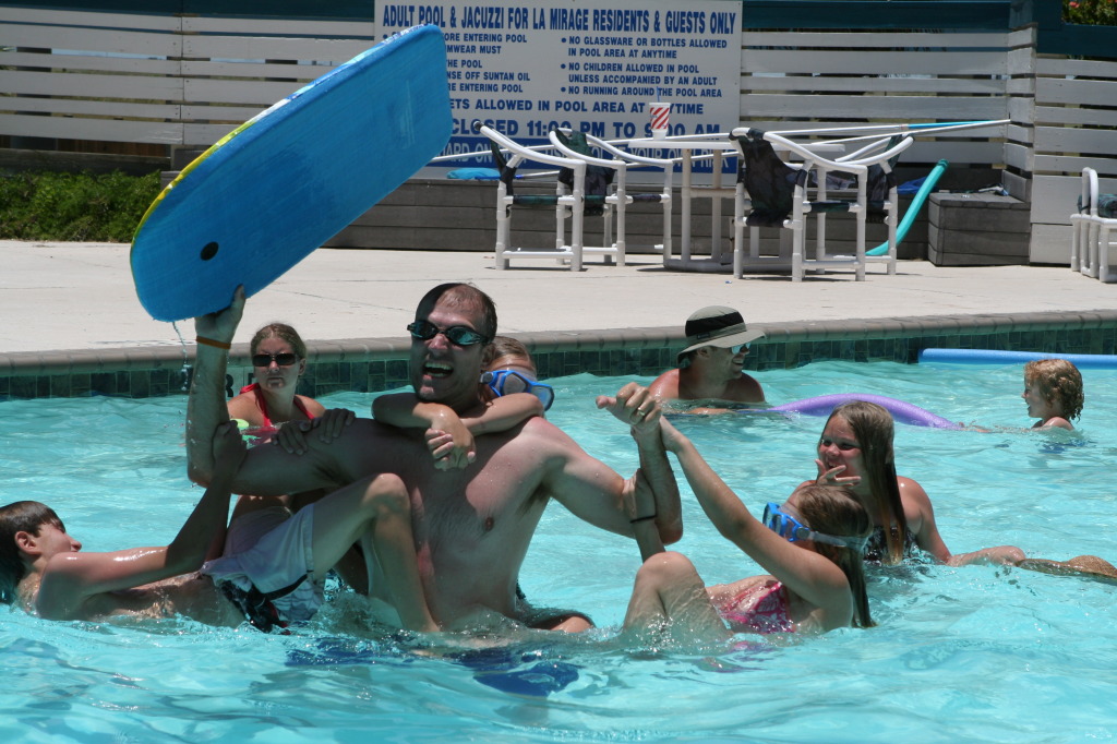 2010-07-05-Port-Aransas-050-Travis-Chance-Dax-pool-wrestling-kids.JPG