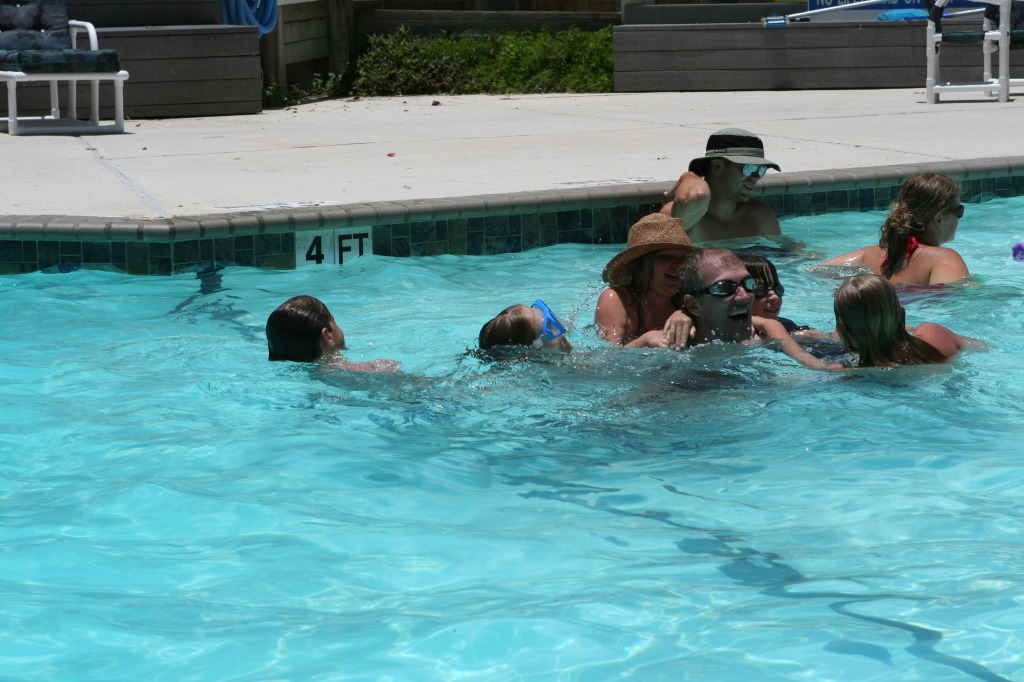 2010-07-05-Port-Aransas-076-Travis-Chance-Dax-pool-wrestling-kids.JPG