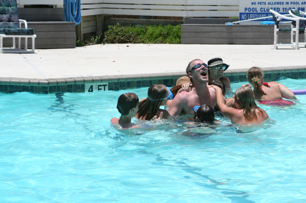 2010-07-05-Port-Aransas-081-Travis-Chance-Dax-pool-wrestling-kids.JPG