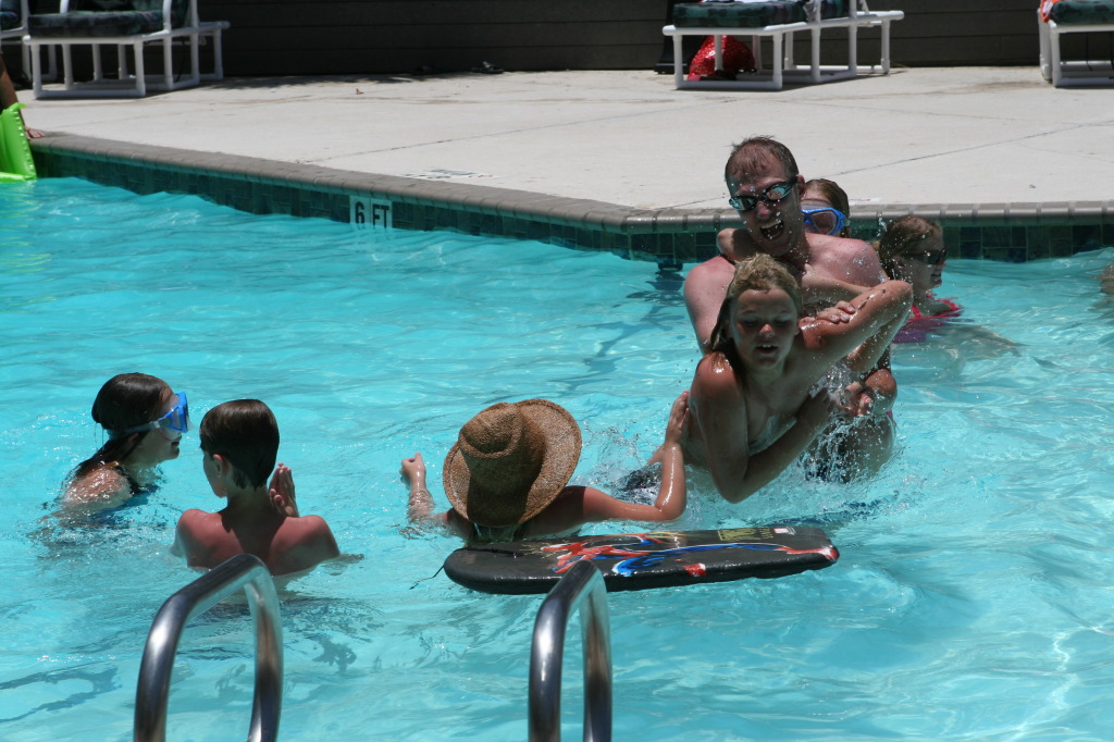 2010-07-05-Port-Aransas-100-Travis-Chance-Dax-pool-wrestling-kids.JPG