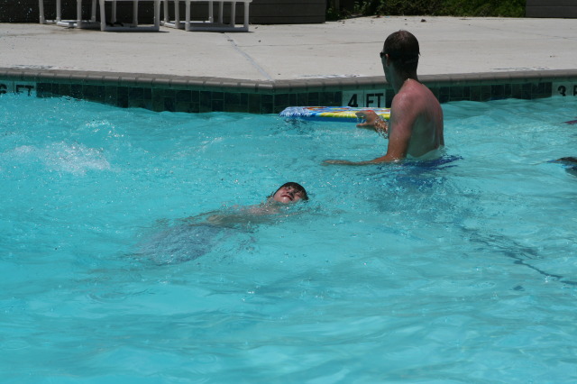 2010-07-05-Port-Aransas-035-Travis-Chance-Dax-pool-wrestling-kids.JPG