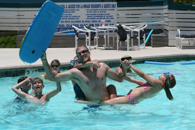 2010-07-05-Port-Aransas-042-Travis-Chance-Dax-pool-wrestling-kids.JPG