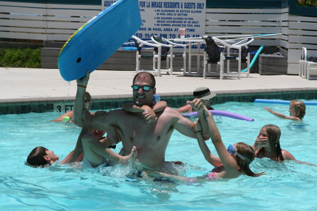 2010-07-05-Port-Aransas-048-Travis-Chance-Dax-pool-wrestling-kids.JPG