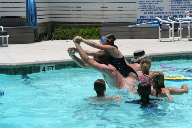 2010-07-05-Port-Aransas-067-Travis-Chance-Dax-pool-wrestling-kids.JPG