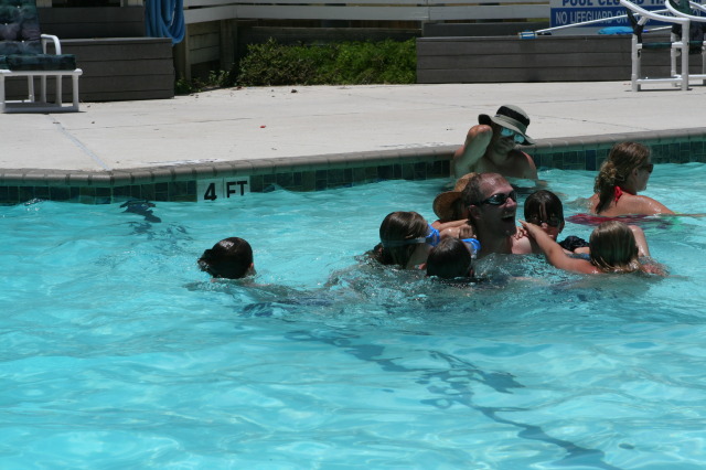2010-07-05-Port-Aransas-074-Travis-Chance-Dax-pool-wrestling-kids.JPG