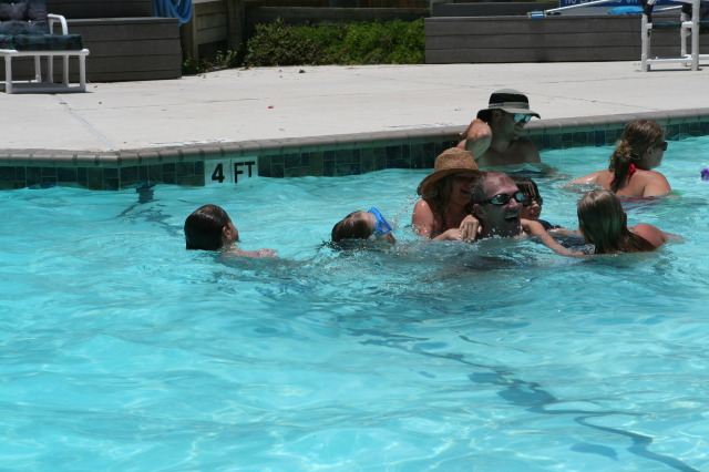 2010-07-05-Port-Aransas-076-Travis-Chance-Dax-pool-wrestling-kids.JPG