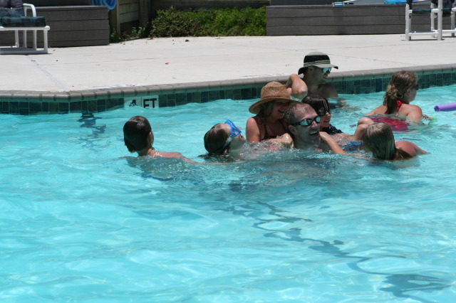 2010-07-05-Port-Aransas-077-Travis-Chance-Dax-pool-wrestling-kids.JPG