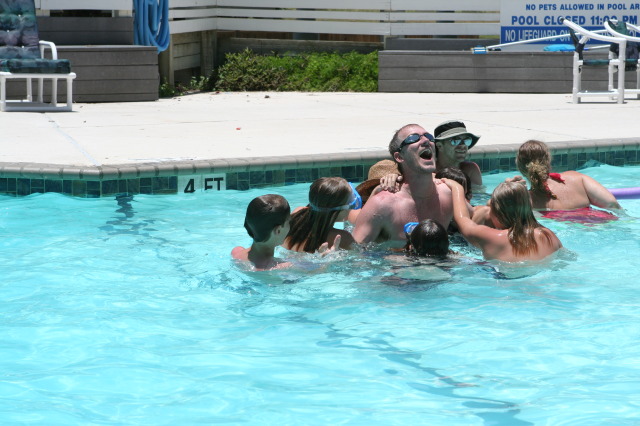2010-07-05-Port-Aransas-081-Travis-Chance-Dax-pool-wrestling-kids.JPG