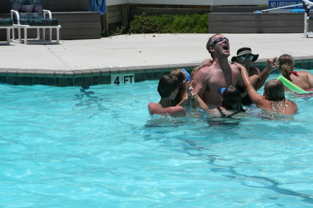 2010-07-05-Port-Aransas-082-Travis-Chance-Dax-pool-wrestling-kids.JPG