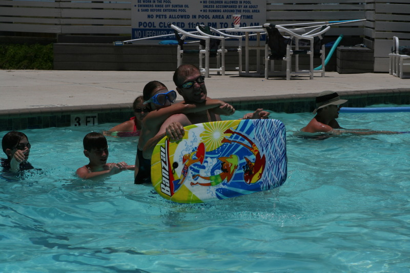 2010-07-05-Port-Aransas-040-Travis-Chance-Dax-pool-wrestling-kids.JPG