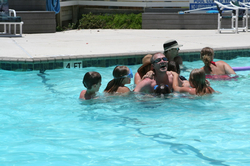 2010-07-05-Port-Aransas-080-Travis-Chance-Dax-pool-wrestling-kids.JPG