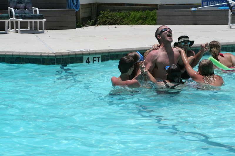2010-07-05-Port-Aransas-082-Travis-Chance-Dax-pool-wrestling-kids.JPG