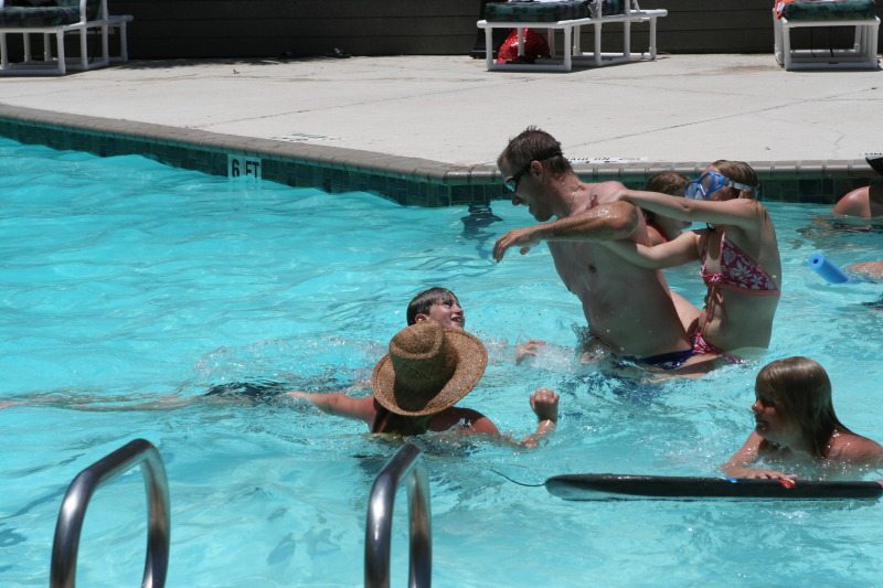 2010-07-05-Port-Aransas-101-Travis-Chance-Dax-pool-wrestling-kids.JPG