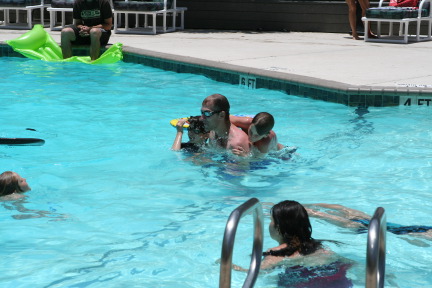 2010-07-05-Port-Aransas-025-Travis-Chance-Dax-pool-wrestling-kids.JPG