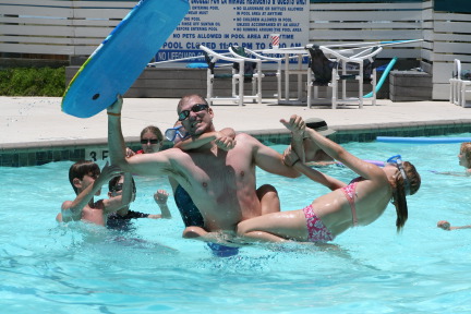 2010-07-05-Port-Aransas-044-Travis-Chance-Dax-pool-wrestling-kids.JPG