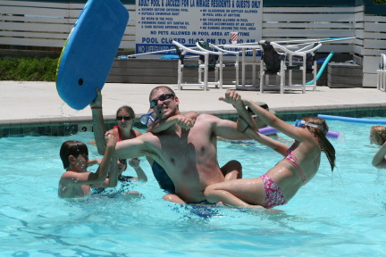 2010-07-05-Port-Aransas-045-Travis-Chance-Dax-pool-wrestling-kids.JPG