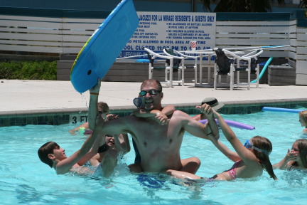 2010-07-05-Port-Aransas-047-Travis-Chance-Dax-pool-wrestling-kids-GOOD.JPG
