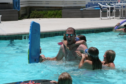 2010-07-05-Port-Aransas-059-Travis-Chance-Dax-pool-wrestling-kids.JPG