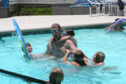 2010-07-05-Port-Aransas-060-Travis-Chance-Dax-pool-wrestling-kids.JPG
