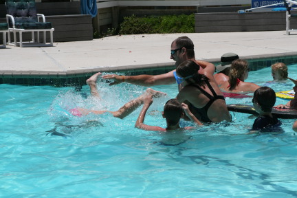 2010-07-05-Port-Aransas-062-Travis-Chance-Dax-pool-wrestling-kids.JPG