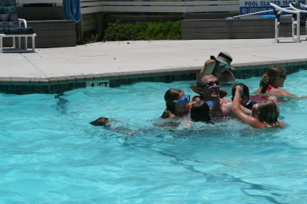 2010-07-05-Port-Aransas-073-Travis-Chance-Dax-pool-wrestling-kids.JPG