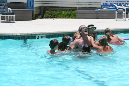 2010-07-05-Port-Aransas-081-Travis-Chance-Dax-pool-wrestling-kids.JPG