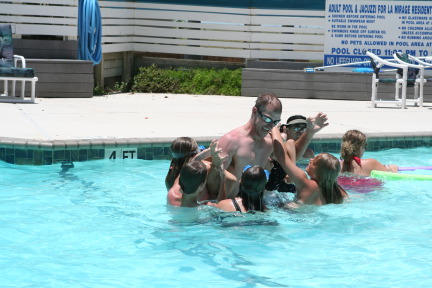 2010-07-05-Port-Aransas-085-Travis-Chance-Dax-pool-wrestling-kids.JPG
