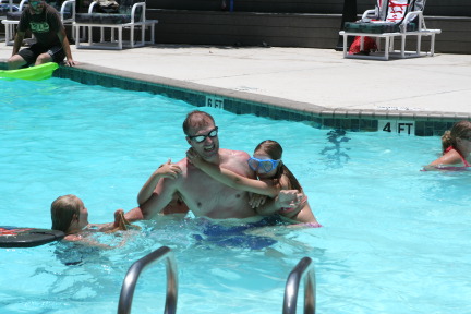 2010-07-05-Port-Aransas-099-Travis-Chance-Dax-pool-wrestling-kids.JPG
