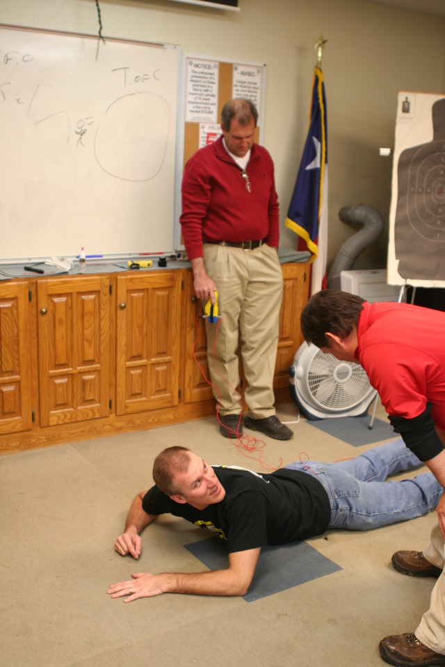 2010/Best_of/2010-01-12-ITOC-R1-TeamLead-008-Travis-gets-tazed-GOOD.JPG