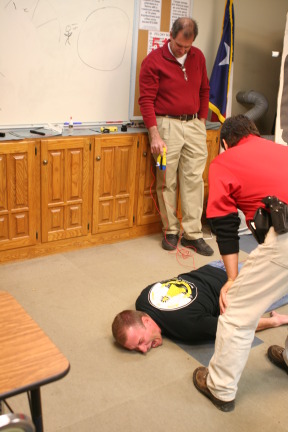 2010-01-12-ITOC-R1-TeamLead-016-Travis-gets-tazed-GOOD.JPG