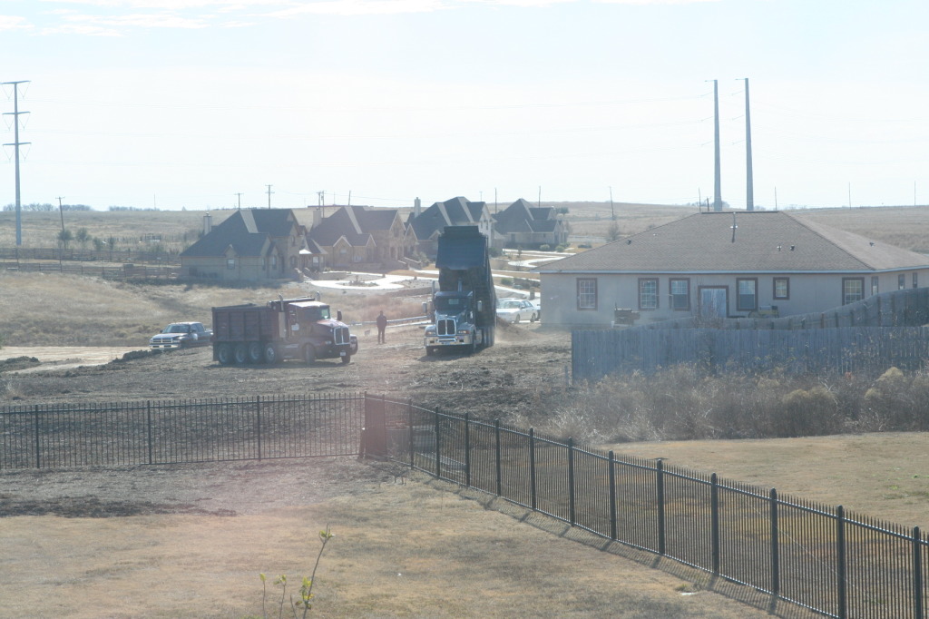 2011-01-08-Neighbor-backyard-work-29-dirt-dumptruck.JPG
