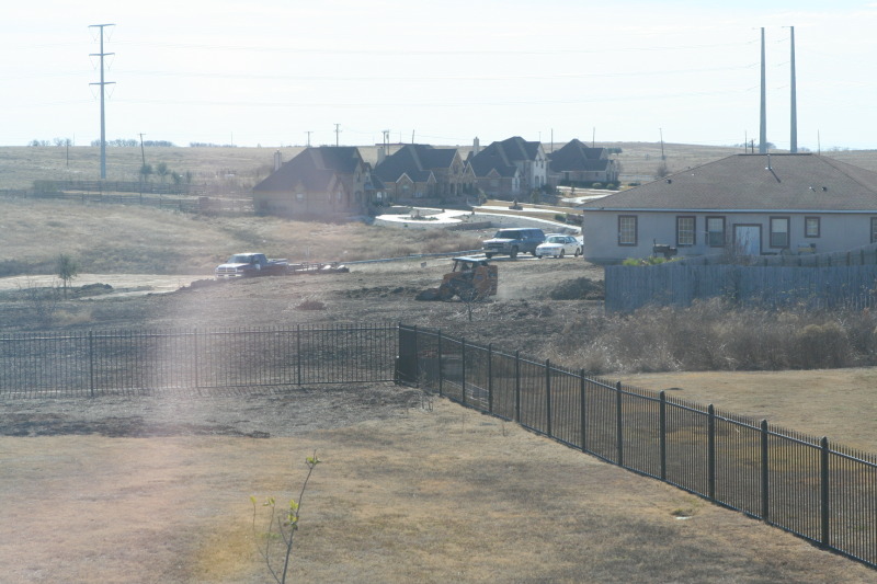 2011-01-08-Neighbor-backyard-work-02.JPG