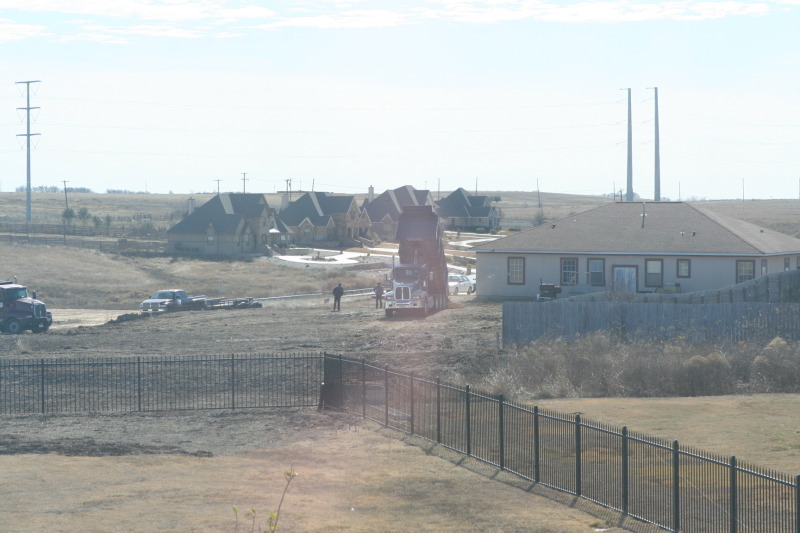 2011-01-08-Neighbor-backyard-work-23-dirt-dumptruck.JPG