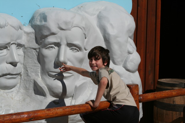 2011-10-05-SD-Wall-Drug-11-Dax-picking-Lincolns-nose-GOOD.JPG