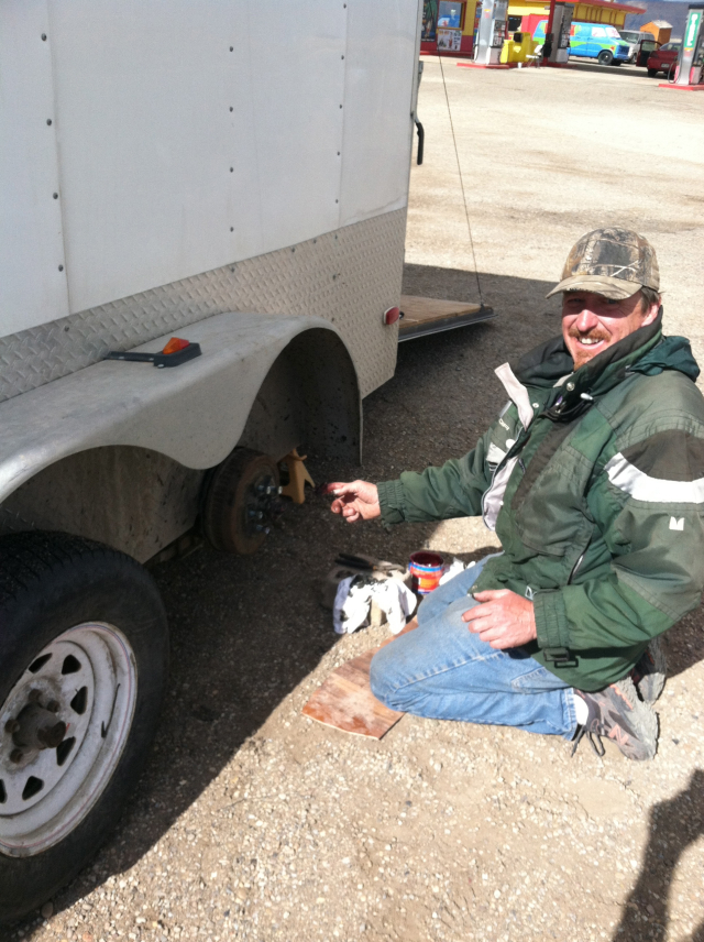 2012-04-Moab-Utah-55-Carl-fixing-lug-screws-on-trailer.jpg