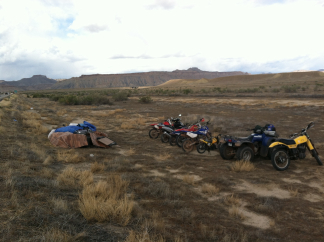 2012-04-Moab-Utah-54-trailer-stuff-in-ditch-after-flat-tires.jpg