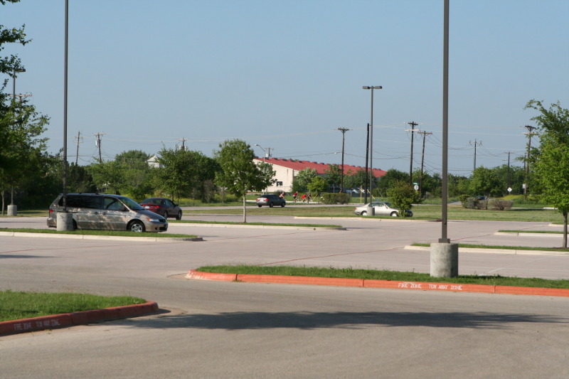 2012-04-01-Troop214-Cycling-Merit-Badge-50-mile-48-almost-done-Church-parking-lot.JPG