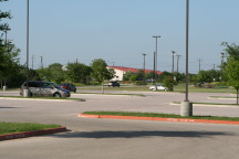 2012-04-01-Troop214-Cycling-Merit-Badge-50-mile-48-almost-done-Church-parking-lot.JPG