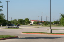2012-04-01-Troop214-Cycling-Merit-Badge-50-mile-49-almost-done-Church-parking-lot.JPG