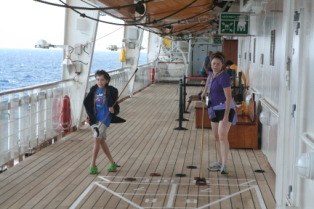 2012-09-30-Disney-Cruise-32-Jack-Suzi-shuffleboard.JPG