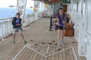 2012-09-30-Disney-Cruise-33-Jack-Suzi-shuffleboard.JPG