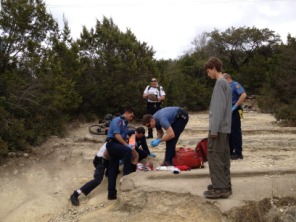 2013-01-27-Practice-Hike-Barton-Springs-Trail-assisting-hurt-biker-2-Chance.JPG