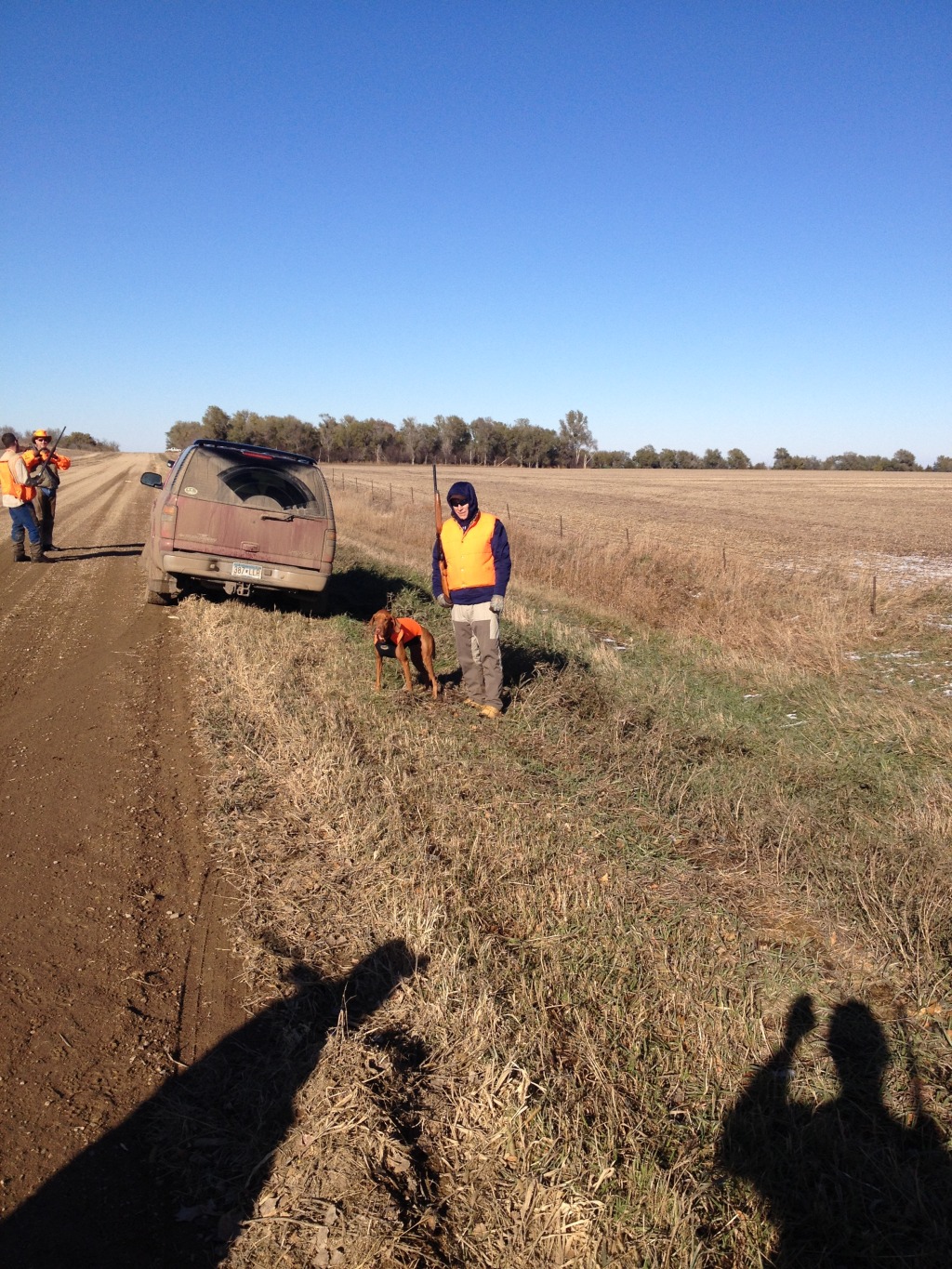 2013/11(November)/SD-Hunting/1024x768_2013-11-07-SD-Pheasant-Hunting-08-Daryl-Mike-Bevo-Tim.JPG