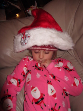 2013-12-23-Christmas-Eve-Eve-84-Sydney-fell-asleep-santa-hat.JPG
