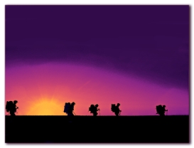 Silhouettehikerscolourfulsunrise.jpg