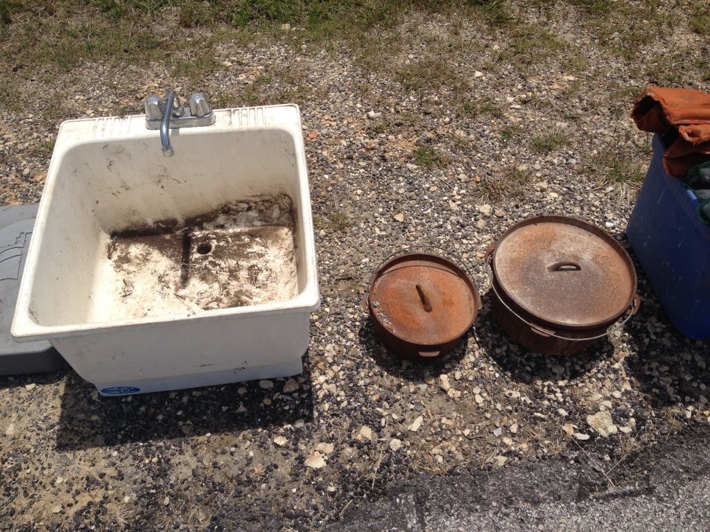 2014-05-17-Cleaning-under-Justins-porch-07-sink-dutch-ovens.JPG