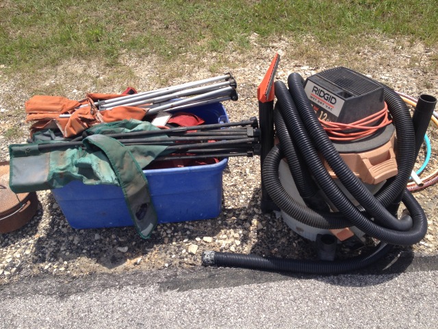 2014-05-17-Cleaning-under-Justins-porch-08-vacuum.JPG